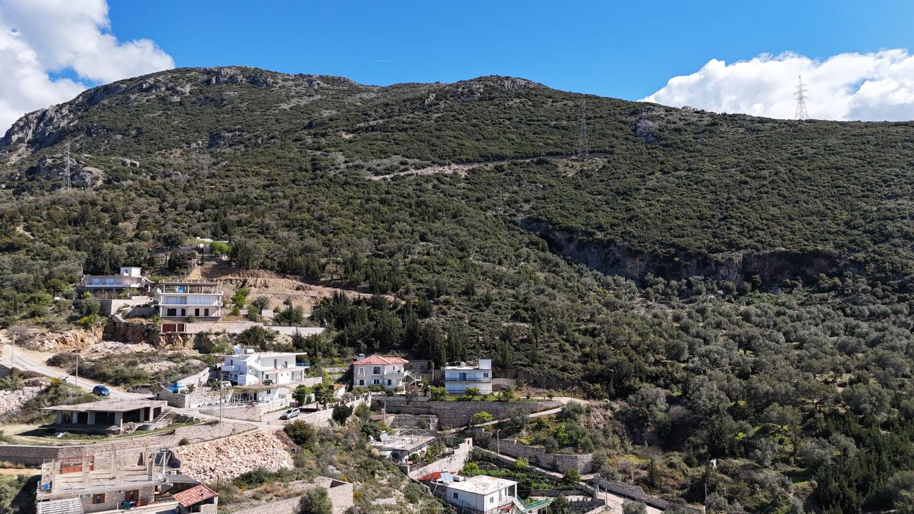 Ground floor apartment for sale in Qeparo, Stone Village II, coastal property Albania, residential complex, near beach, real estate investment.