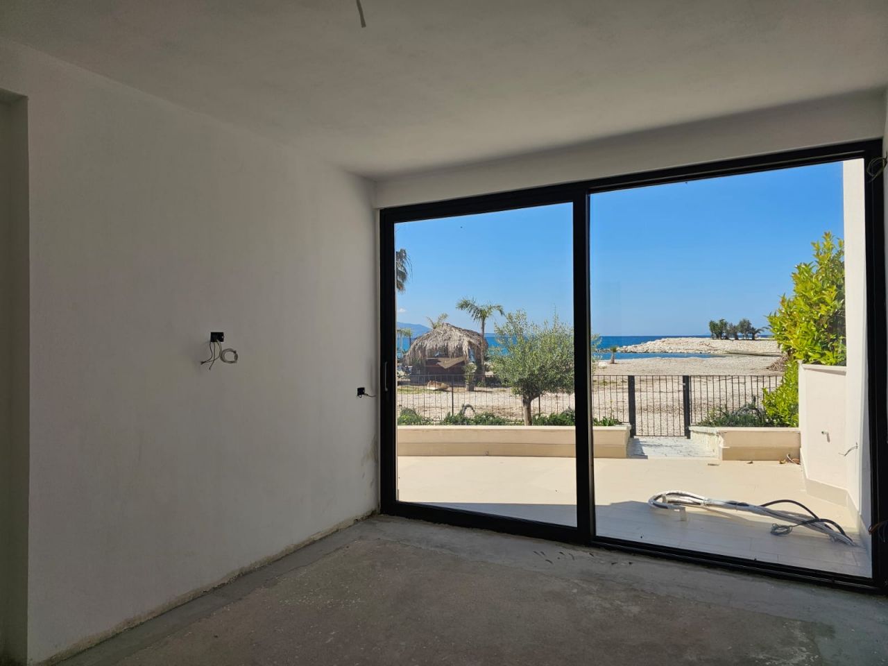 First Line Apartment For Sale With a Full View Of The Ionian Beach